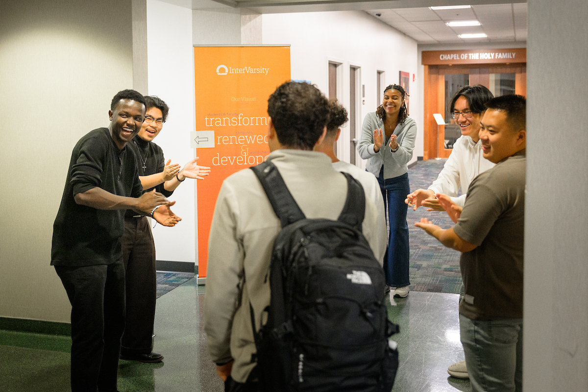 Students greeting each other at a chapter event