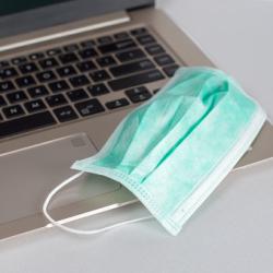 ONSO Bootcamp Collection text over an image of a facemask sitting atop a laptop.