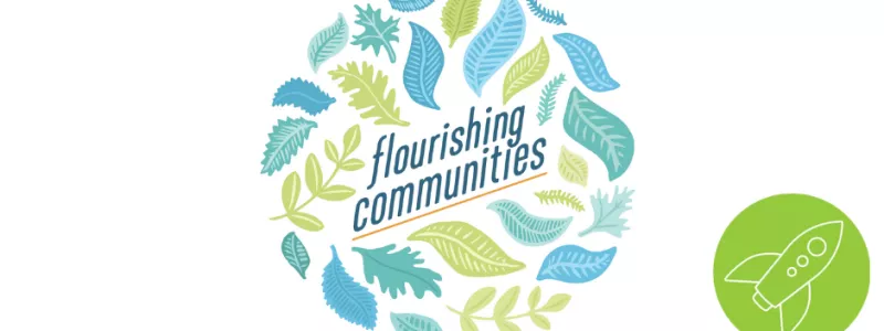 Green, teal, blue variety of leaves in a circle surrounding text reading "flourishing communities"
