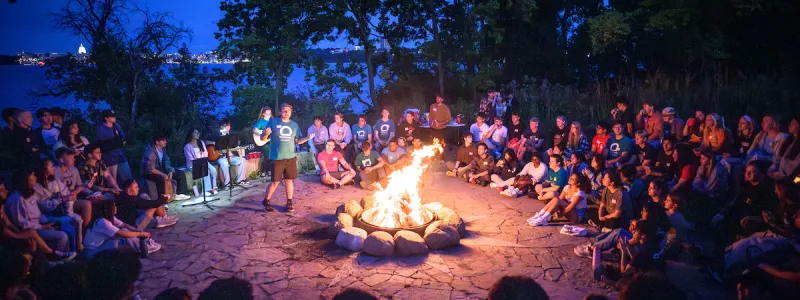 Group of students around a campfire