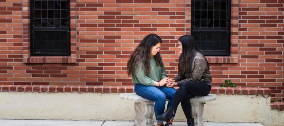 pair praying outside