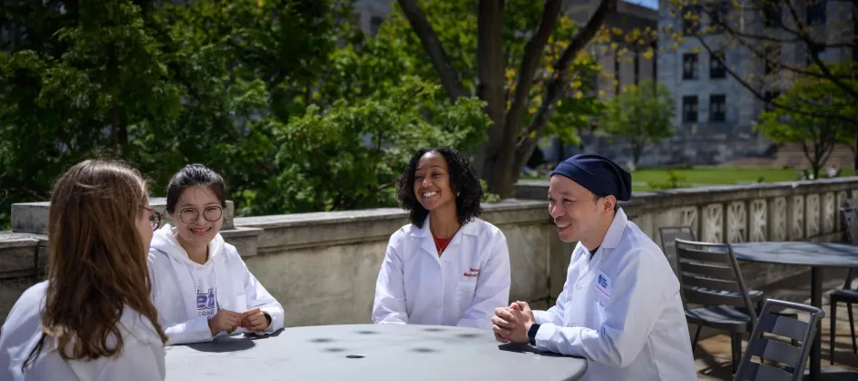 students sitting around a table