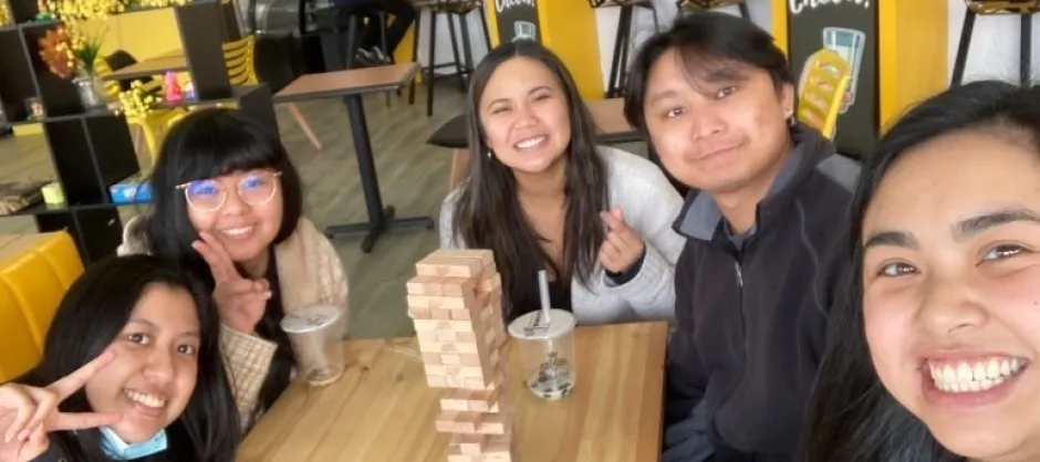students playing jenga