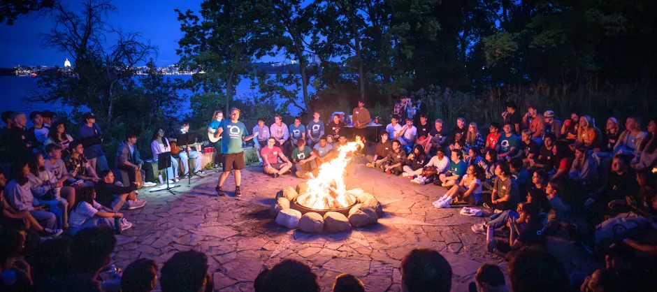 Group of students around a campfire
