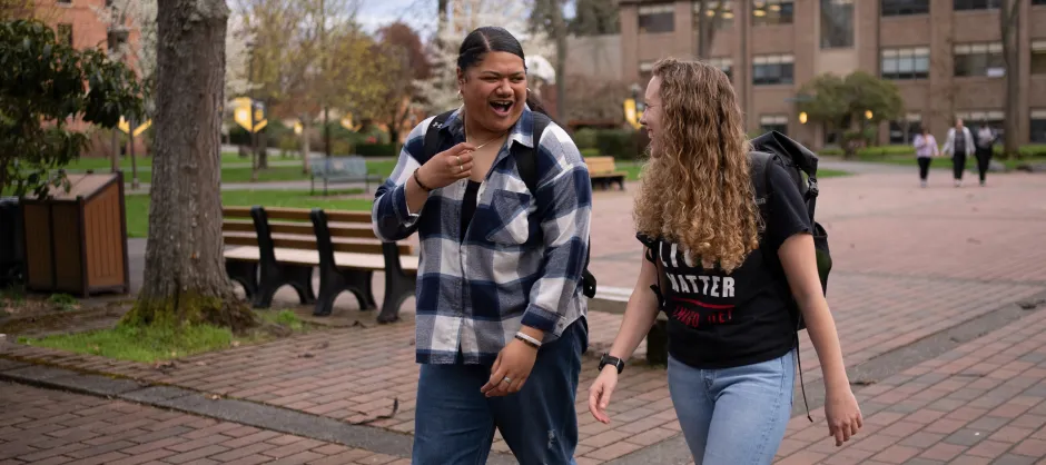 Two college students talking.