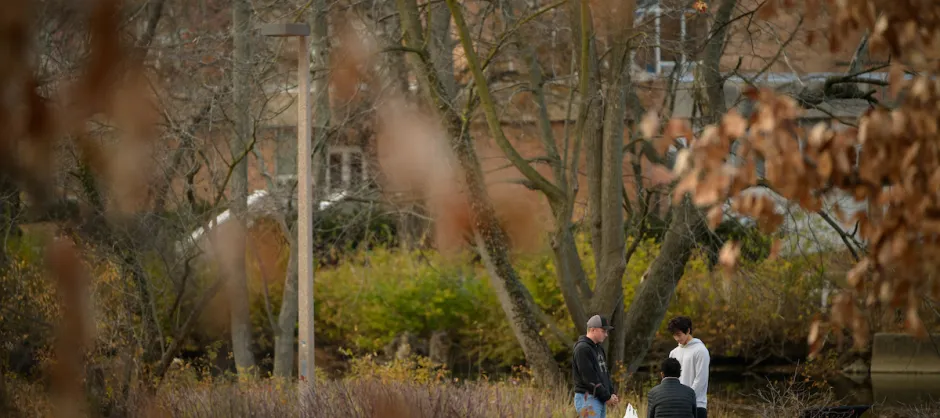 3 people on outdoors on campus