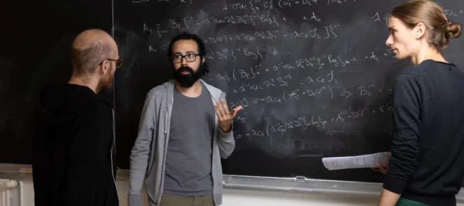 Man standing by whiteboard