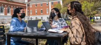 5 Tips for Leading a Latino Small Group rectangle (three people at a table conversing)