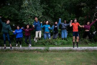 a group of people jumping in the air